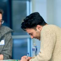 International Anchor Allies Winter 2026 First Mixer - a student completing a check-in process